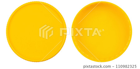 Top view of yellow plastic lid isolated on white background. Plastic round jar lid. Top view of yellow plastic lid isolated on white background. Plastic round jar lid. 110982325