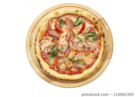 Delicious pizza served on wooden plate isolated on white background. 110982393