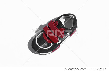 children's stylish sneakers with velcros isolated on a white background children's stylish sneakers with velcros isolated on a white background 110982514
