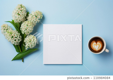 Flat lay with hyacinth blossom with coffee cup and open notebook, rustic background 110984084