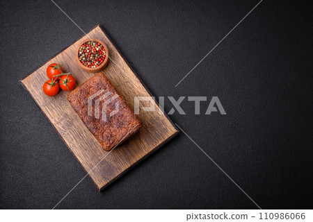 Delicious fresh crispy brown bread with seeds and grains 110986066