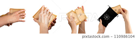 Lodz, Poland January 07 2024 Tarot cards set, taro in hands isolated on white Lodz, Poland January 07 2024 Tarot cards set, taro in hands isolated on white 110986104