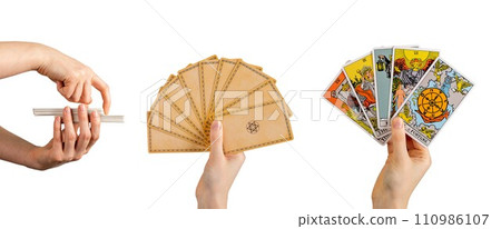 Lodz, Poland January 07 2024 Tarot cards set, taro in hands isolated on white 110986107