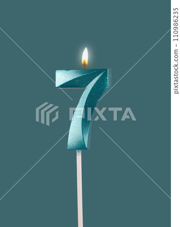 7 birthday, number candles with light, isolated on white background 7 birthday, number candles with light, isolated on white background 110986235