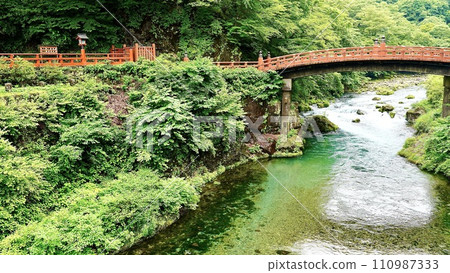 Shinbashi, the red bridge in front of Nikko Toshogu Shrine 110987333