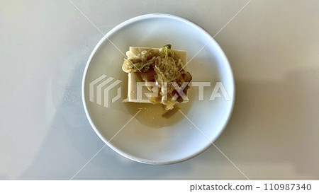 Cold tofu topped with green onions and ginger Cold tofu topped with green onions and ginger 110987340