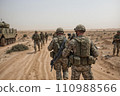 Soldier with assault rifle on the desert 110988566