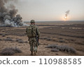 soldier with gun during shooting in the battlefield 110988585