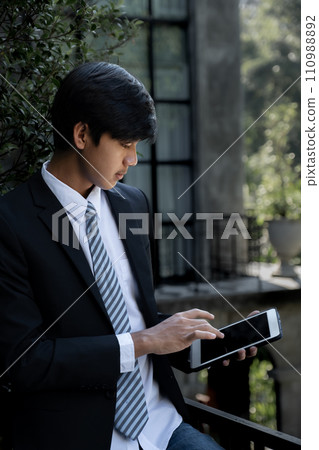 Successful businessman financier investors use laptop to communicate remotely over the internet or video call to set challenging business goals and ready to achieve targets from home office 110988892