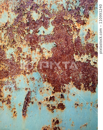 Rusty metal background with streaks of rust. Corroded metal background. Rust stains. Rusty corrosion. 110991240