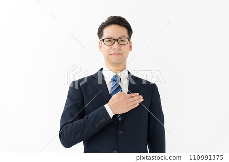 Businessman hitting his chest 110991375