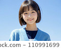 High school girl smiling healthy against the blue sky AI generated 110991699