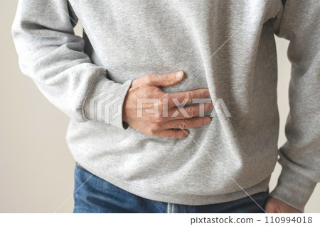 Man with abdominal pain body parts Man with abdominal pain body parts 110994018