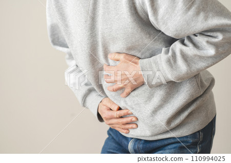 Man with abdominal pain body parts Man with abdominal pain body parts 110994025