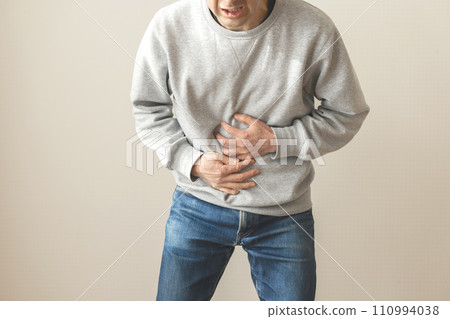 Man with abdominal pain body parts Man with abdominal pain body parts 110994038