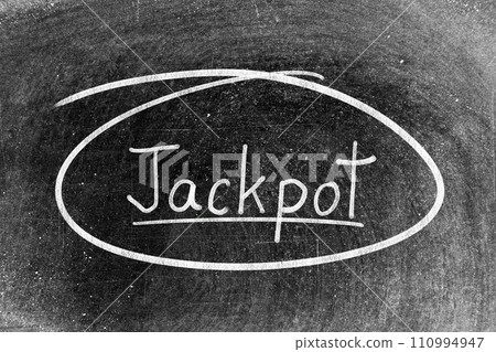White chalk hand writing in word jackpot and circle shape on blackboard background White chalk hand writing in word jackpot and circle shape on blackboard background 110994947