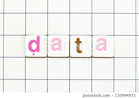 Colorful tile letter in word data on white grid background Colorful tile letter in word data on white grid background 110994971