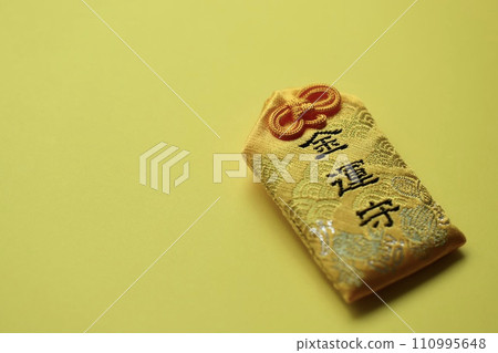 Japanese lucky charm: Yellow cloth fortune charm 110995648