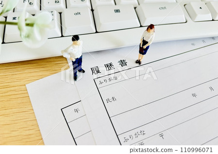 Young new graduate writing resume Young new graduate writing resume 110996071