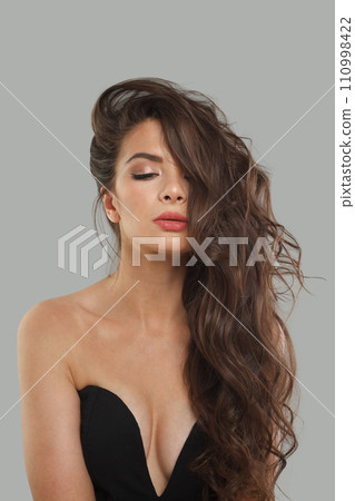 Lovely stylish young woman with perfect healthy skin and long hair Lovely stylish young woman with perfect healthy skin and long hair 110998422