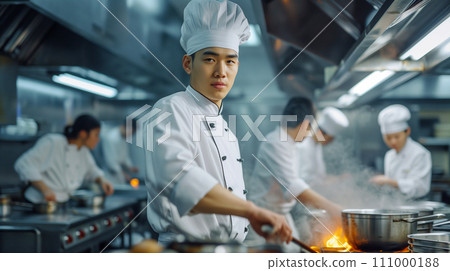 Concentrated chef and his team in modern restaurant kitchen. Image of restaurant/cooking. AI image 111000188