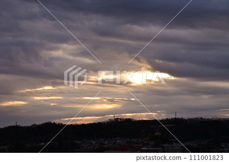 sunlight leaking through the clouds sunlight leaking through the clouds 111001823