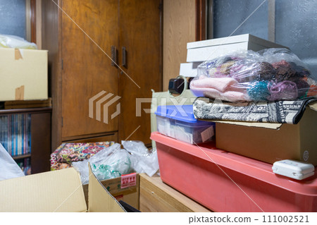 Storage room (closet) in an old house with lots of things 111002521