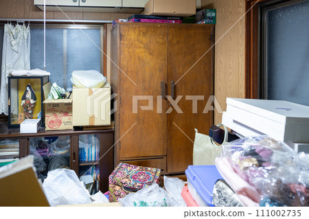 Storage room (closet) in an old house with lots of things 111002735