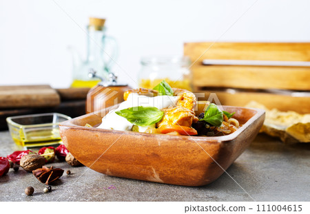 Butter chicken curry. baked chicken with sauce 111004615