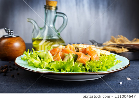 salad with fresh salmon, cucumber and olive oil salad with fresh salmon, cucumber and olive oil 111004647