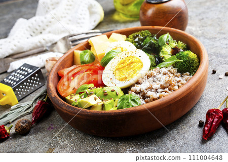 Boiled buckwheat with egg and fresh vegetables Boiled buckwheat with egg and fresh vegetables 111004648