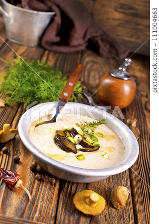 Cream-soup with porcini mushroom with croutons Cream-soup with porcini mushroom with croutons 111004663