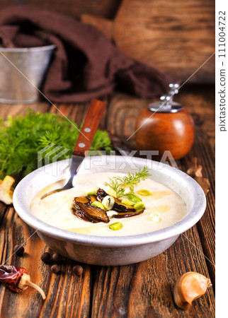 Cream-soup with porcini mushroom with croutons Cream-soup with porcini mushroom with croutons 111004722