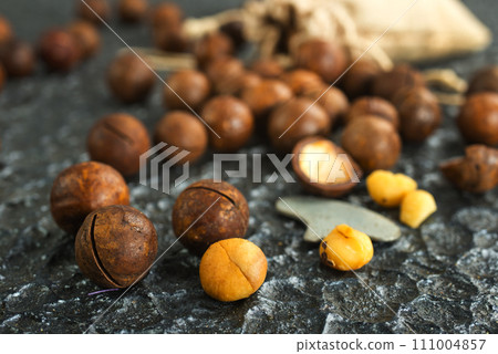 Organic Macadamia nut on wooden table, helthy food 111004857