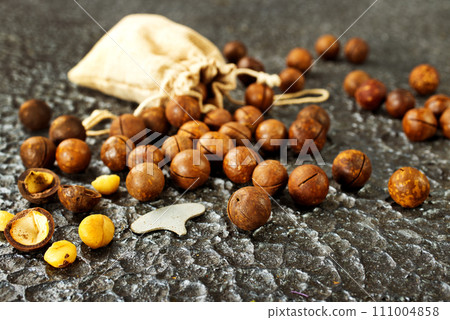 Organic Macadamia nut on wooden table, helthy food 111004858