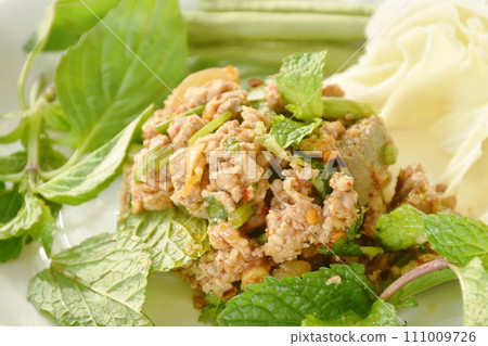 Thai spicy chop pork and slice skin with liver salad on plate Thai spicy chop pork and slice skin with liver salad on plate 111009726