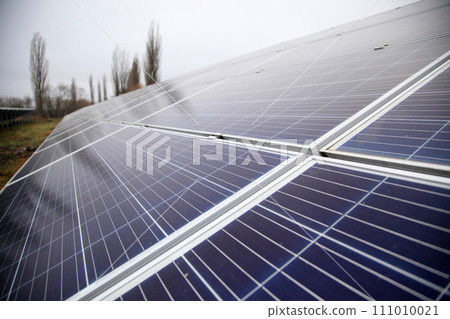 Solar panel. Solar panels installed in a rural area. Solar power plant in a field. Solar panel produces green, environmentally friendly energy from the sun. 111010021