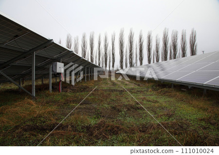 Solar panel. Solar panels installed in a rural area. Solar power plant in a field. Solar panel produces green, environmentally friendly energy from the sun. 111010024