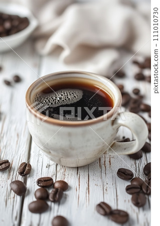Cup of aromatic black coffee on a white rustic wooden background Cup of aromatic black coffee on a white rustic wooden background 111010730