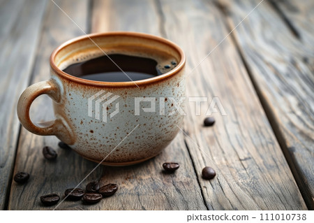Cup of aromatic black coffee on a brown wooden background 111010738