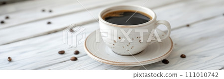 Cup of aromatic black coffee on a white rustic wooden background Cup of aromatic black coffee on a white rustic wooden background 111010742