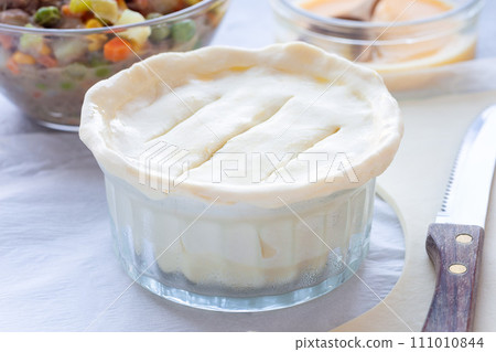 Making individual beef pot pies, step 5, make top, vertical Making individual beef pot pies, step 5, make top, vertical 111010844