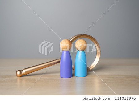 Two people and a magnifying glass. Figures of people. Human resources. Headhunter. Recruiting, staffing. Hiring best talented professional candidate for a vacant job position. Employment agency Two people and a magnifying glass. Figures of people. Human resources. Headhunter. Recruiting, staffing. Hiring best talented professional candidate for a vacant job position. Employment agency 111011970