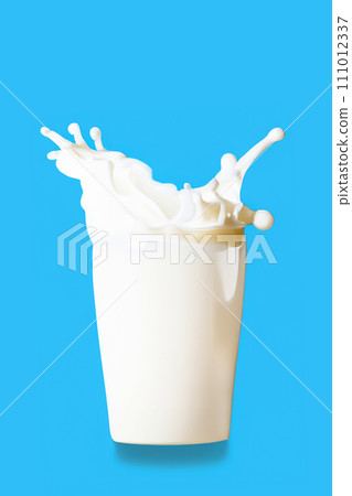 Glass of milk with splashes isolated on blue background 111012337