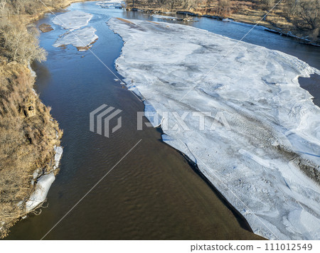 aerial view of the South Platte RIver and plains in eastern Colorado in winter scenery aerial view of the South Platte RIver and plains in eastern Colorado in winter scenery 111012549