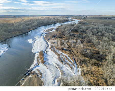 aerial view of the South Platte RIver and plains in eastern Colorado in winter scenery aerial view of the South Platte RIver and plains in eastern Colorado in winter scenery 111012577