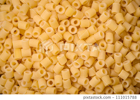 Delicious ditali pasta from durum wheat with salt and spices Delicious ditali pasta from durum wheat with salt and spices 111015788