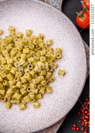 Delicious ditali pasta from durum wheat with salt and spices Delicious ditali pasta from durum wheat with salt and spices 111015827