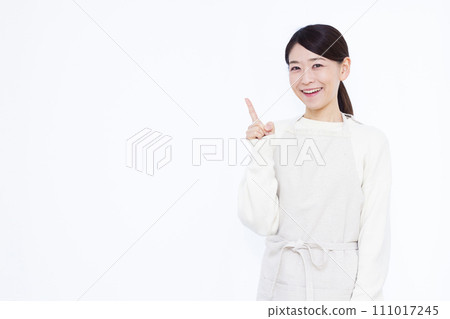 Housewife in her 40s pointing 111017245