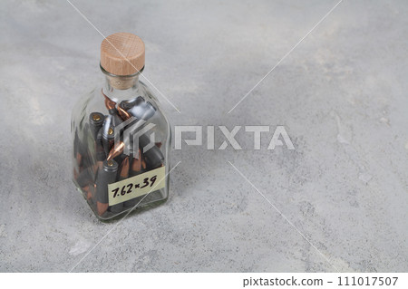 kalashnikov 7.62mm bullets in glass jar 111017507